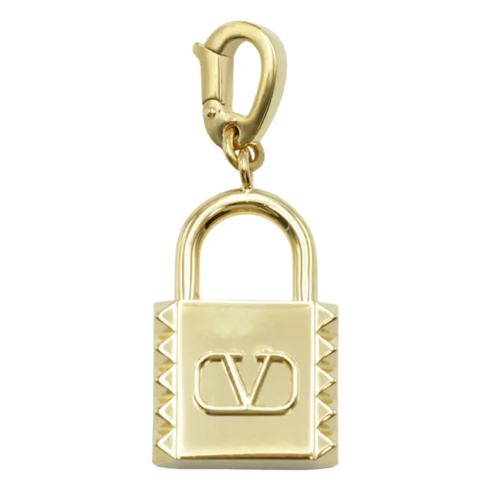 Charm metallico dorato a forma di lucchetto