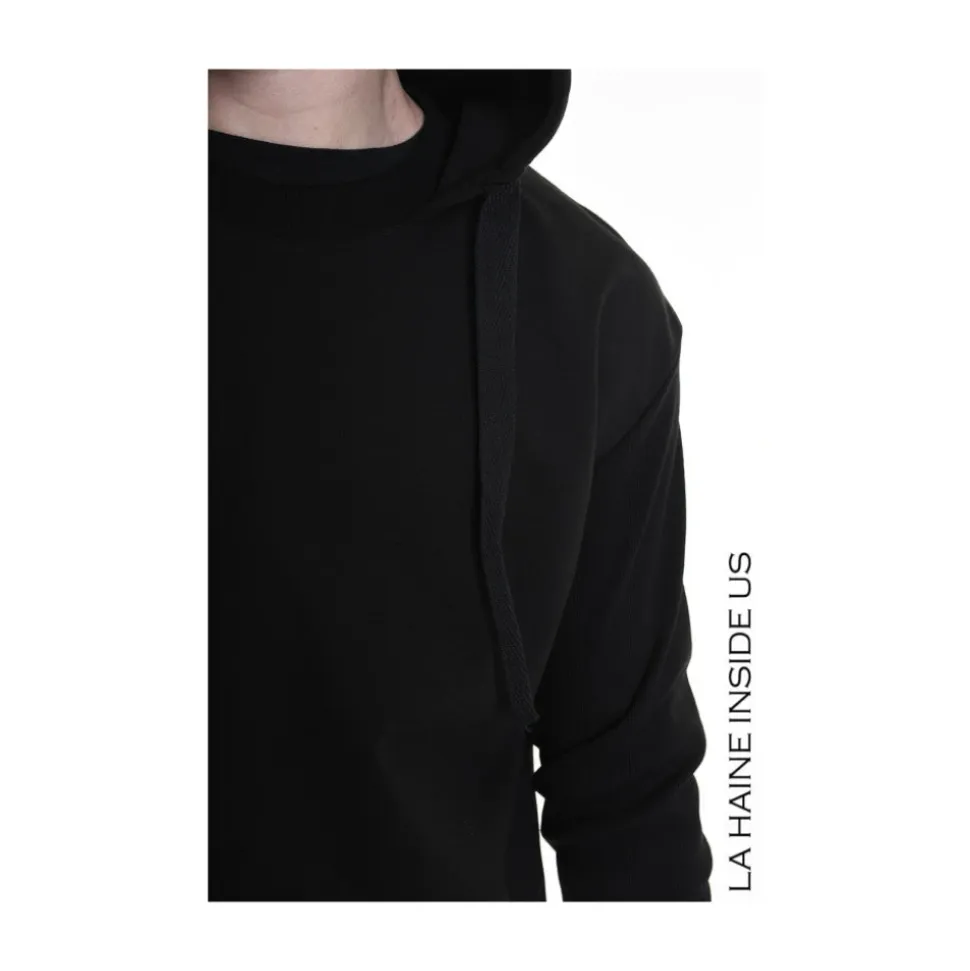 Elegante felpa con maniche a costine