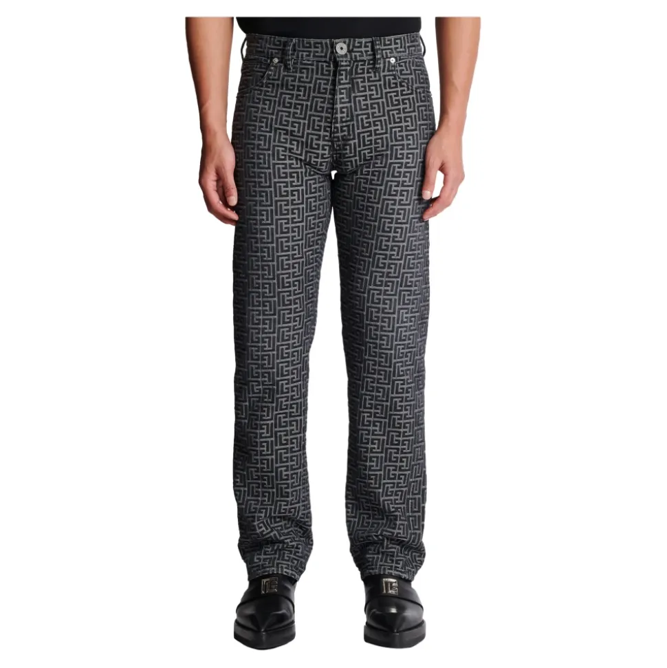 Jeans in denim jacquard con monogramma