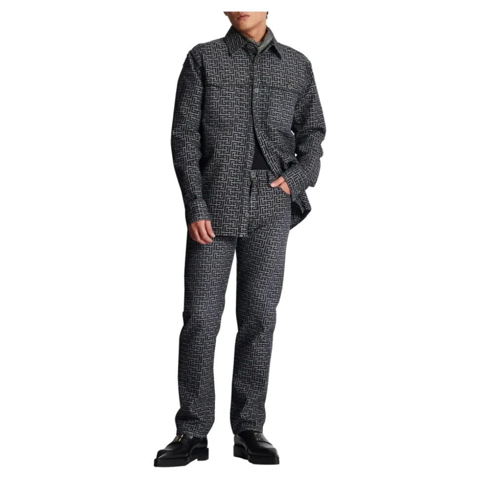 Jeans in denim jacquard con monogramma