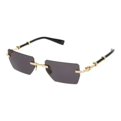 Occhiali da sole eleganti in oro e nero