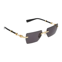 Occhiali da sole eleganti in oro e nero