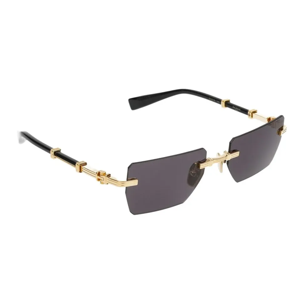 Occhiali da sole eleganti in oro e nero