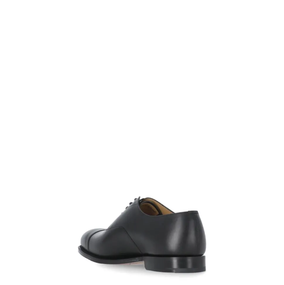 Scarpe basse stringate in pelle nera