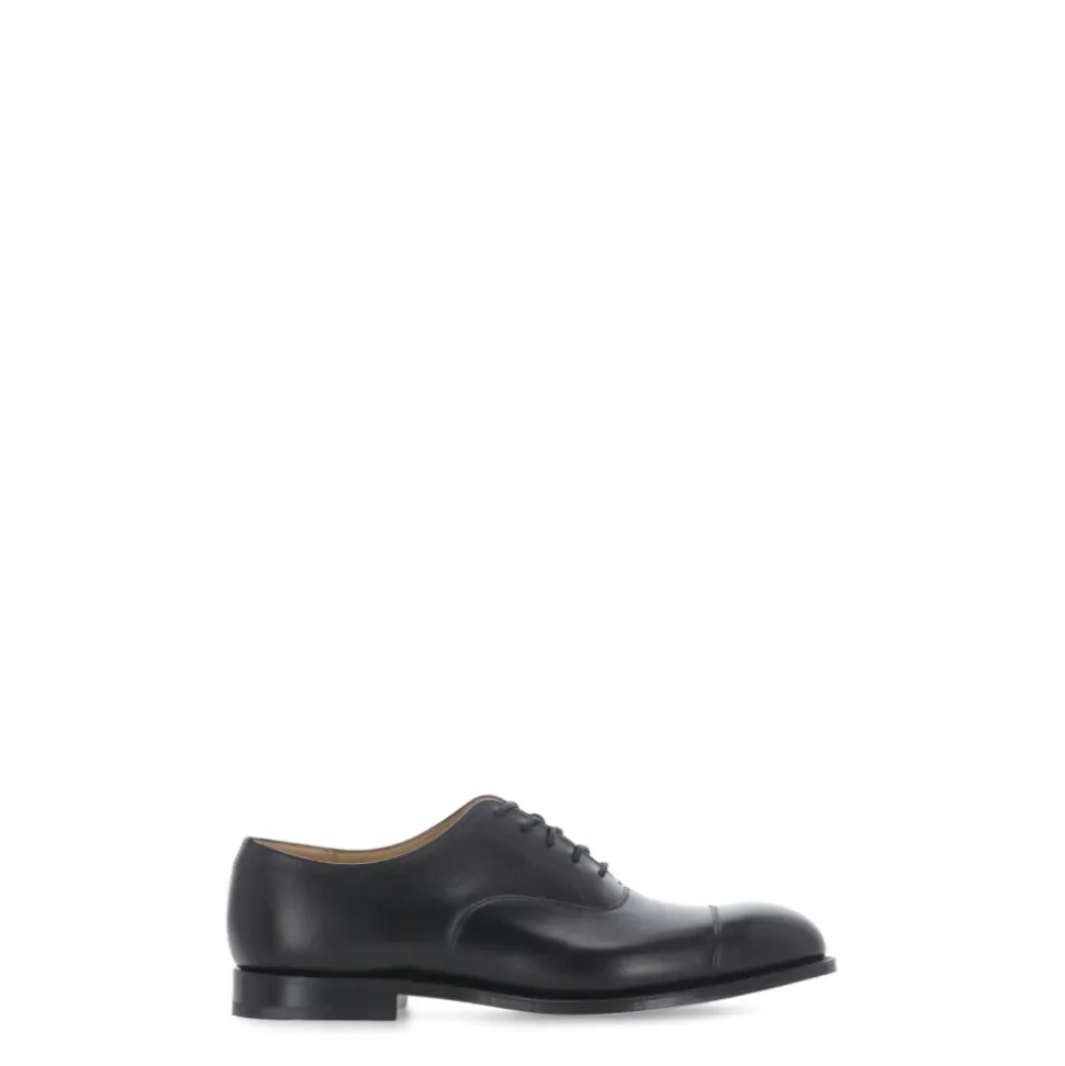 Scarpe basse stringate in pelle nera