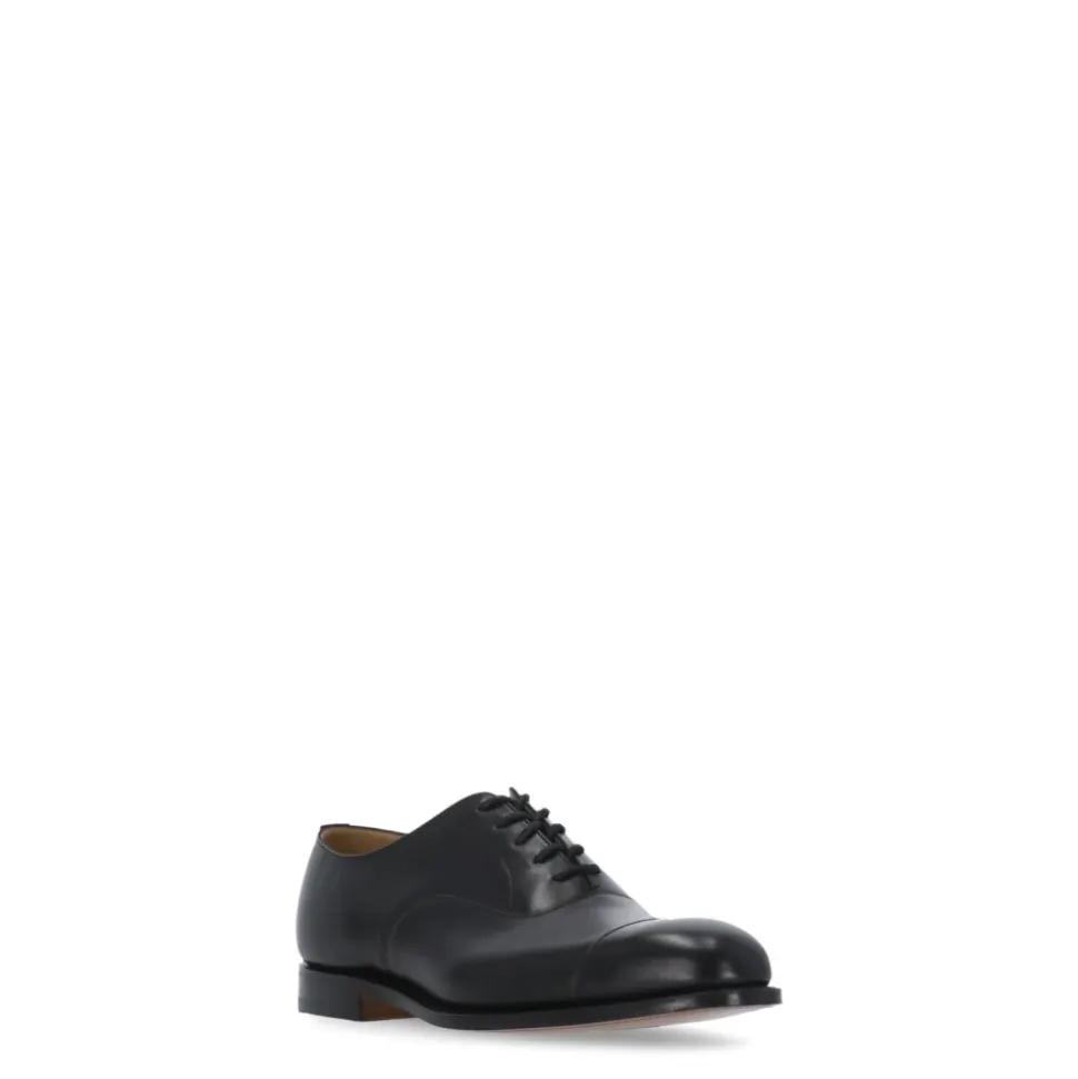 Scarpe basse stringate in pelle nera